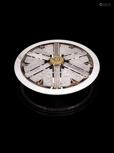 λ A SILVER CIRCULAR TABLE CENTREPIECE WITH A REMOVABLE GOLD ...