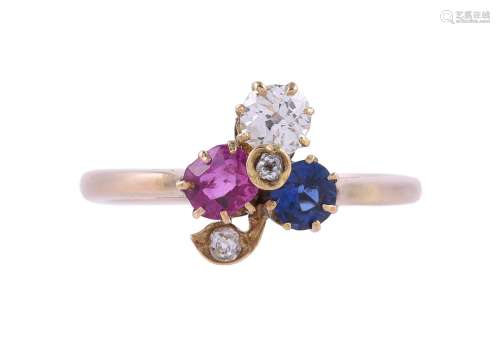 AN EARLY 20TH CENTURY RUBY, SAPPHIRE AND DIAMOND THREE LEAF ...