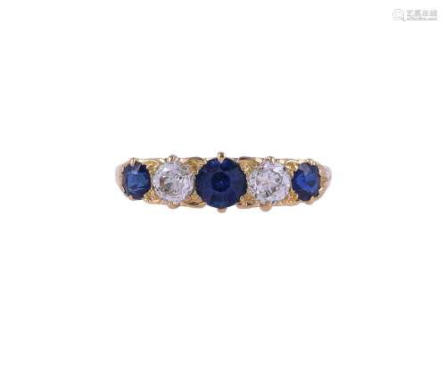 AN EARLY 20TH CENTURY SAPPHIRE AND DIAMOND FIVE STONE RING