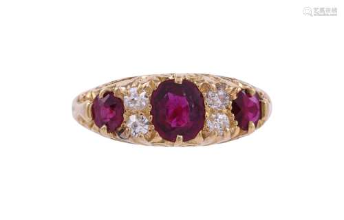 A RUBY AND DIAMOND SEVEN STONE RING