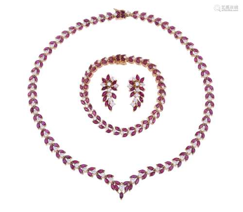 AN EARLY 1980S 18 CARAT GOLD, RUBY AND DIAMOND NECKLACE, BRA...