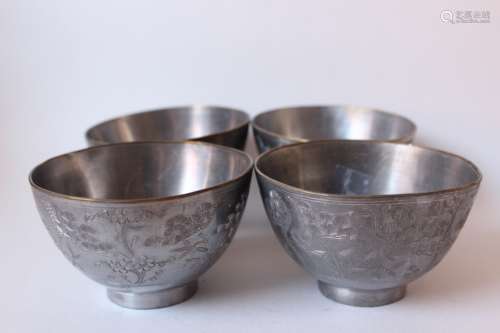 Four Chinese Engraved Tea Cups