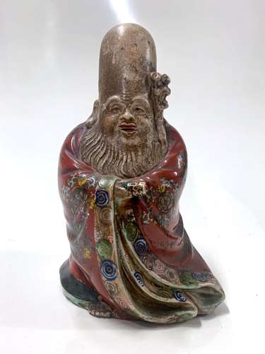 CHINE<br />
Figurine en porcelaine en émaux représentant Sho...