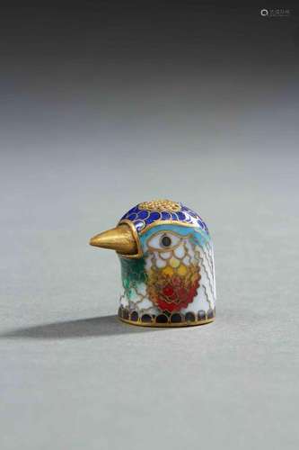 CHINE<br />
Rare tête de perdrix en bronze cloisonné doré et...