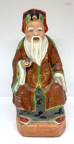 CHINE<br />
Figurine en porcelaine polychrome représentant u...