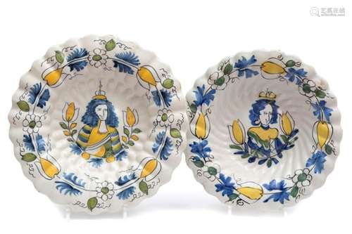 A pair of William and Mary Delft pottery chargers