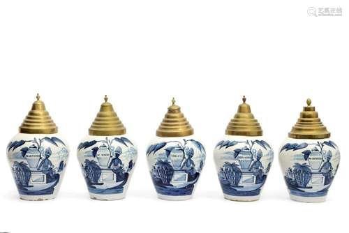 A set of five blue and white Delft pottery tobacco jars