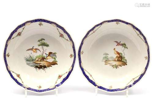 Two The Hague decorated Tournai porcelain round open serving...