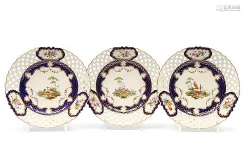 Three The Hague decorated Tournai porcelain reticulated plat...