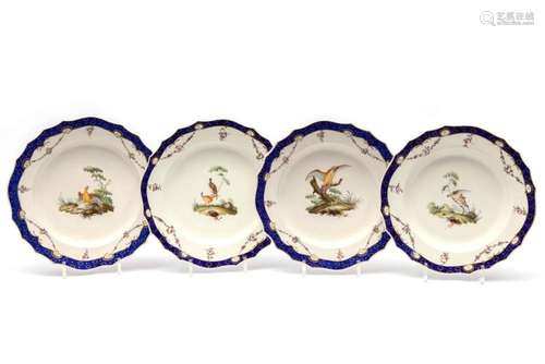 Four The Hague decorated Tournai porcelain large plates