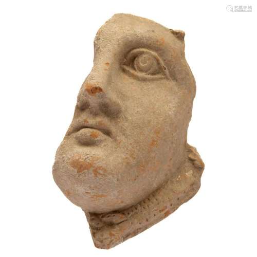 Ancient Greek terracotta face fragment