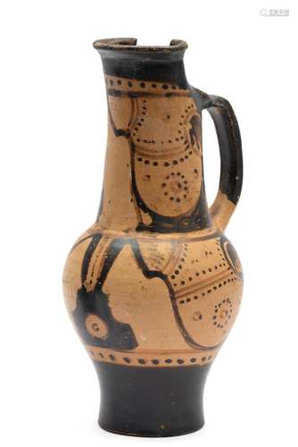 An Etruscan red-figure oinochoe