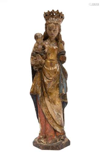 A French carved, polychromed and parcel-gilt oak group of th...