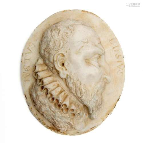 An oval carved marble profile portrait relief of Justus Lips...