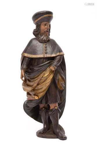 A carved and polychrome painted wooden figure of Saint Roch