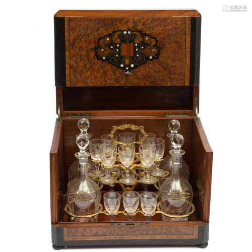 A French amboyna and brass liquor cabinet