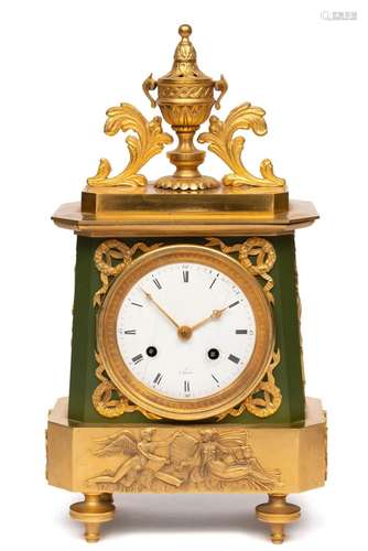 A late Empire ormolu and green patinated mantle clock