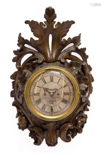 A George III carved wooden cartel clock