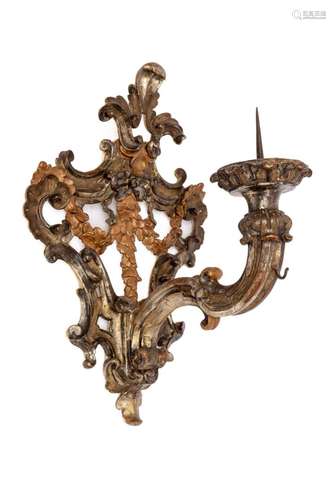 An Italian silver-gilt and brown painted wall applique