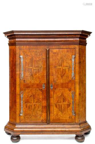 A Swiss iron-mounted walnut, burr-maple and fruitwood cupboa...