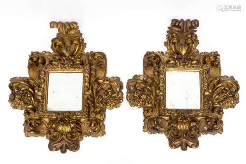 A pair of Italian carved giltwood mirrors