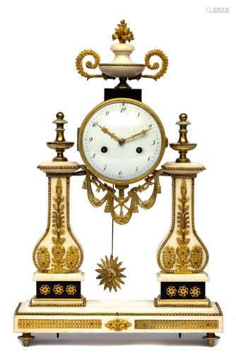 A Louis XVI ormolu and white marble mantle clock