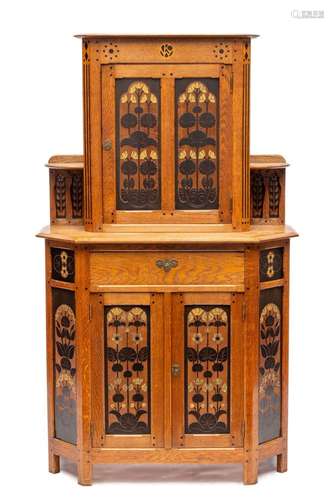 A Dutch Nieuwe Kunst carved and painted oak sideboard