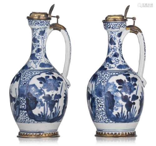 A similar pair of Japanese Arita blue and white ewers, Edo p...