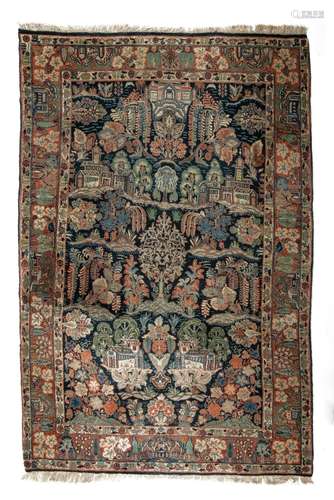 An Oriental woollen carpet, decorated with architectural mot...