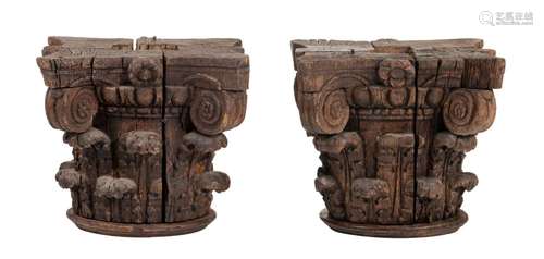 A pair of decorative oak Corinthian capitals, 17thC, H 24,5 ...