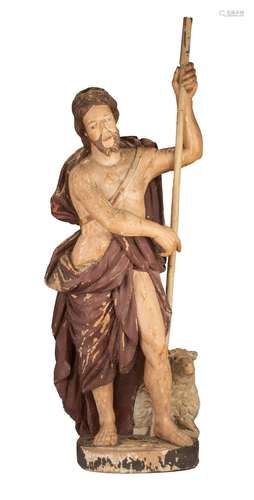 A polychrome painted wooden sculpture of Saint John the Bapt...