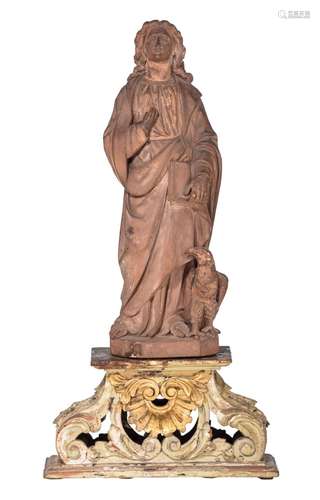 A terracotta sculpture of Saint John, on a polychrome wooden...