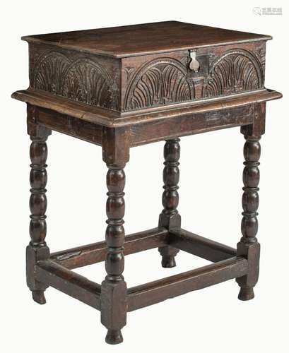 An English Jacobean carved oak chest-on-foot, 17thC, H 80 - ...