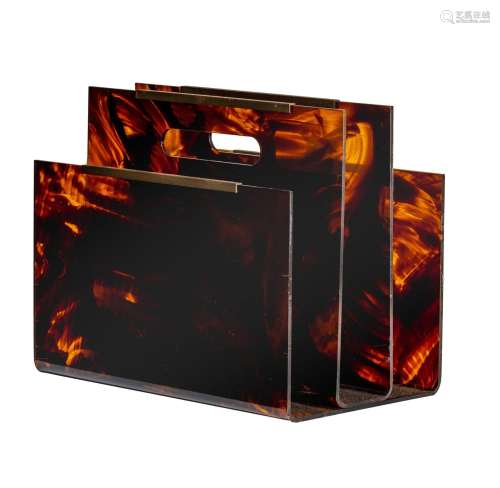 A tortoiseshell imitation lucite magazine rack holder, in th...