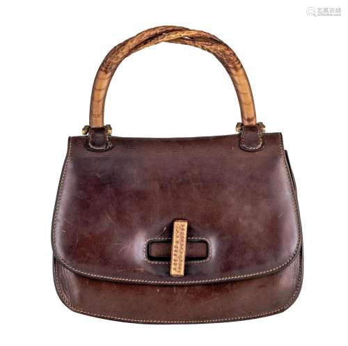 A Gucci vintage handbag with a wooden handle and lock, H 18,...