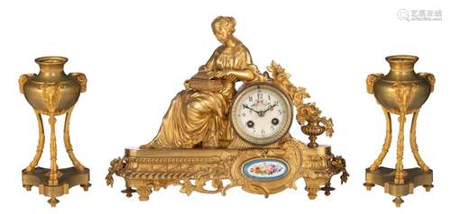 A gilt bronze Napoleon III mantle clock, with a pair of matc...