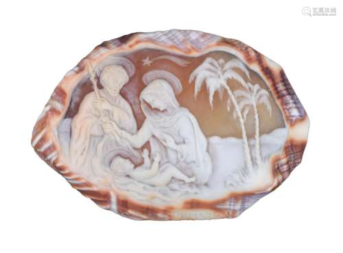 A cameo carved shell depicting the Holy Family, signed 'Trim...