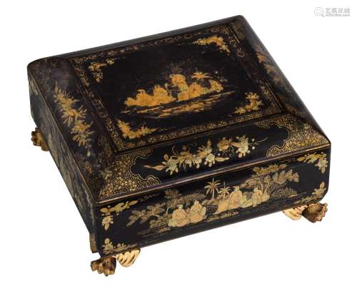 A chinoiserie lacquered games box, H 11,5 - W 24 - D 23 cm