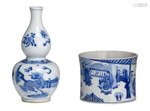 A Chinese blue and white double gourd vase and a blue and wh...