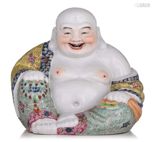 A Chinese famille rose figure of a smiling Budai, with an im...
