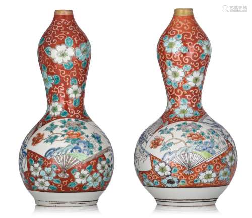 A pair of Japanese Kutani coral-red ground double-groud vase...