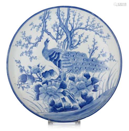 A Japanese Arita blue and white 'Peacock' charger, 19thC, ¯ ...