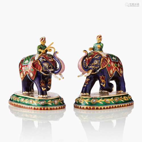 A Pair of North Indian Enamelled Gold Elephants and Mahouts