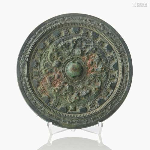 A Chinese Bronze Mirror with Inscriptions