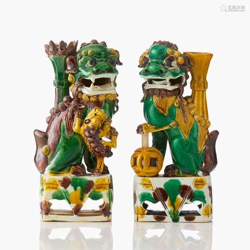 Two Biscuit-Glazed Famille Verte Buddhist Lions