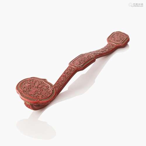 A Chinese Carved Cinnabar Lacquer Ruyi Sceptre