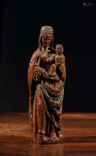 Vierge à l'Enfant en chêne sculpté et polychromé, dos platNo...