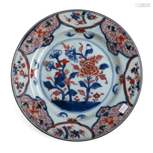A BLUE AND WHITE AND COPPER RED DISH