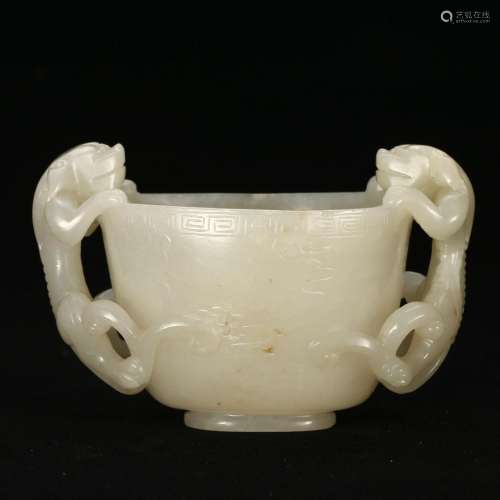 A WHITE JADE CUP WITH BEAST-FORMED HANDLES