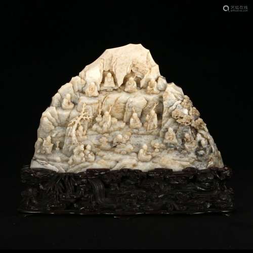 A WHITE JADE 'FIGURES' BOULDER WITH STAND